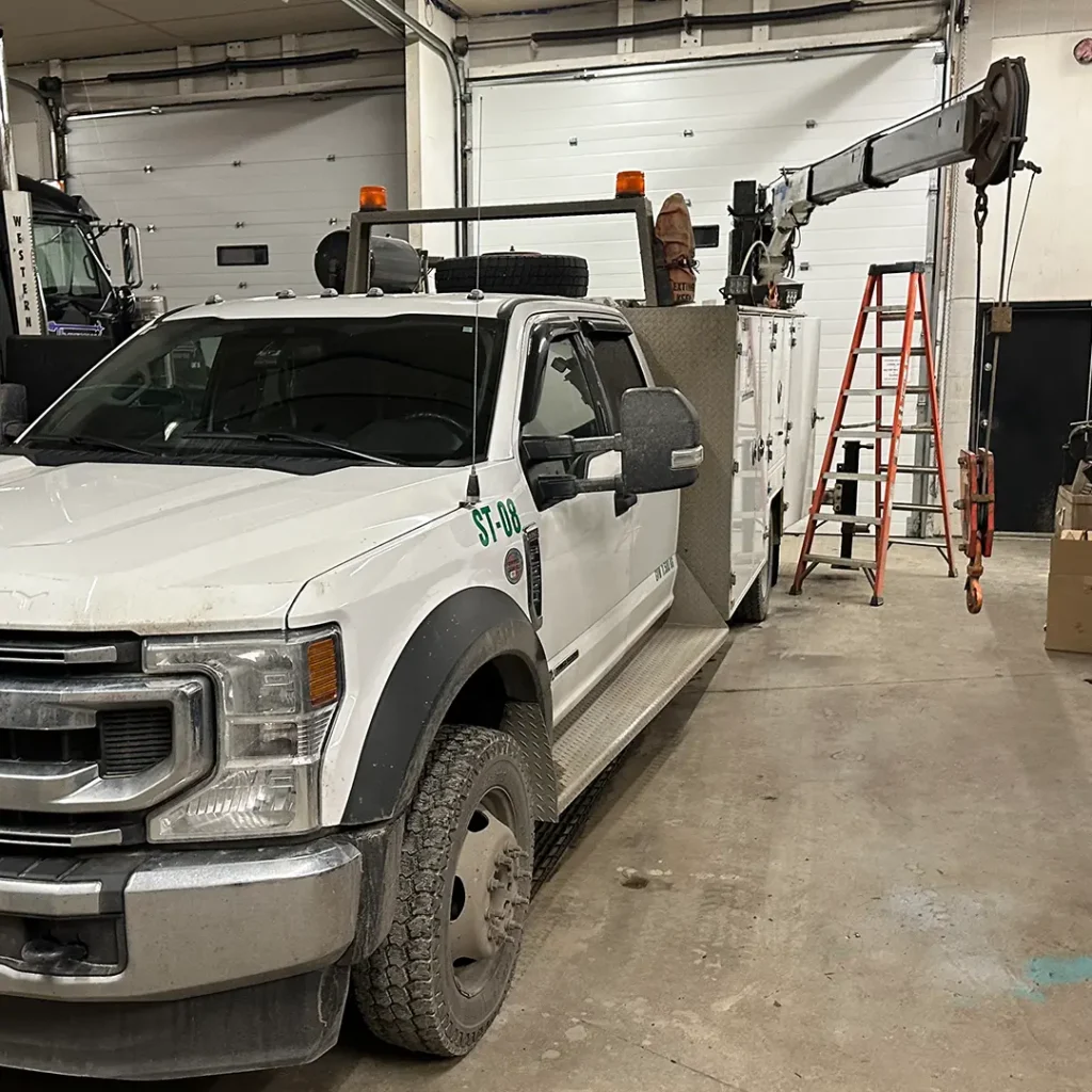Truck-mounted crane in the shop